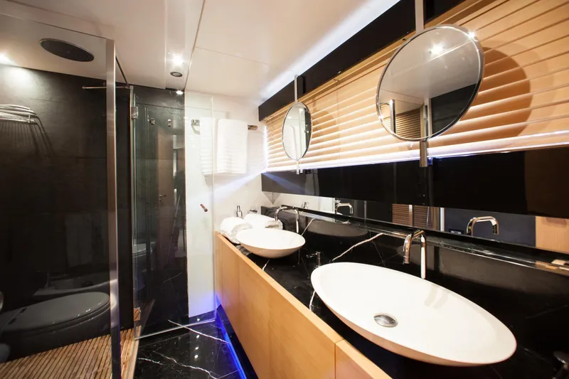  Yacht Photos Pics Luxurious bathroom in 2010 Canados 90 yacht with modern fixtures and elegant design.
