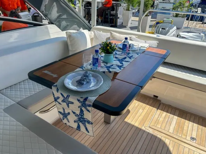  Yacht Photos Pics Elegant dining setup on the 2024 Windy 40 Camira SX yacht.