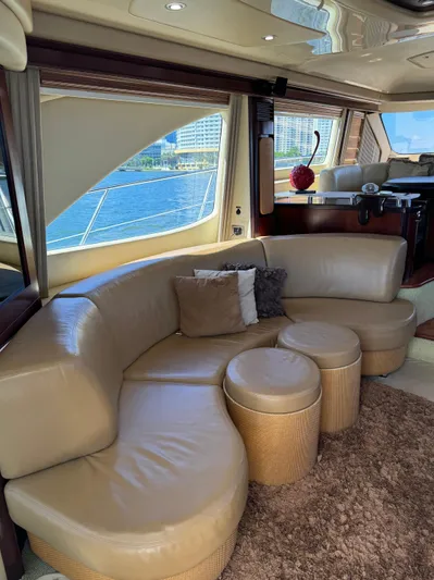  Yacht Photos Pics Luxurious interior of 2005 Sea Ray 58 Sedan Bridge yacht with leather seating.
