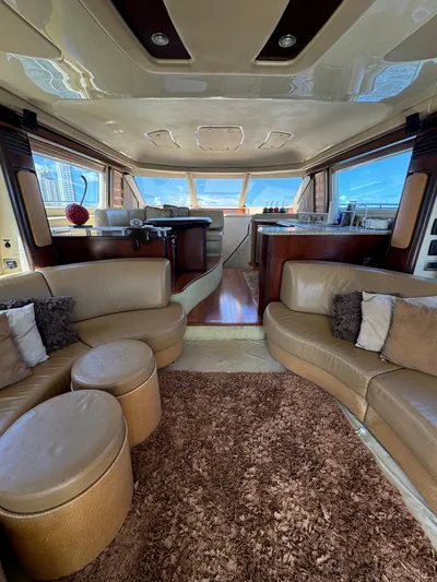  Yacht Photos Pics Luxurious interior of a 2005 Sea Ray 58 Sedan Bridge yacht with plush seating.