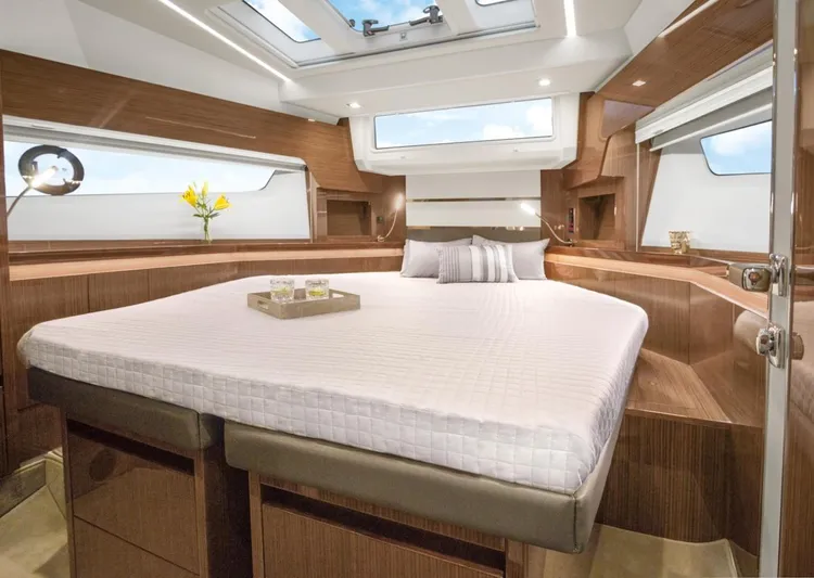  Yacht Photos Pics Luxurious cabin interior of 2024 Sealine F430 yacht with modern design and skylight.