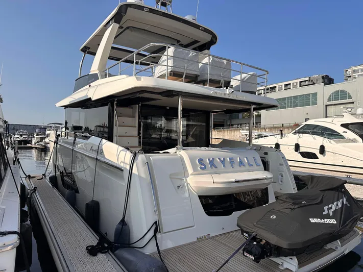 Skyfall Yacht Photos Pics Absolute 52 Navetta Yacht 2022 docked, side view.