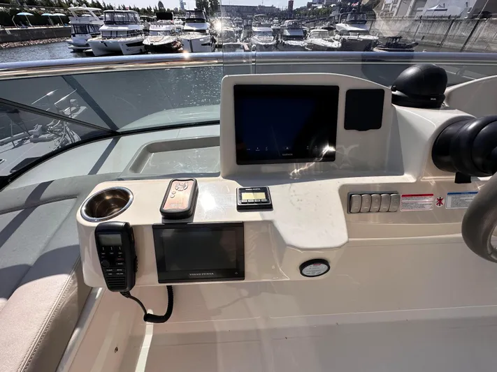 Skyfall Yacht Photos Pics Helm of Absolute 52 Navetta yacht, 2022 model, featuring modern electronics.