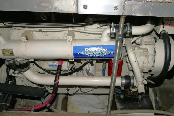 Code Four Yacht Photos Pics Engine compartment of a 2000 Carver 406 Motor Yacht, featuring Diamond Performance Series components.