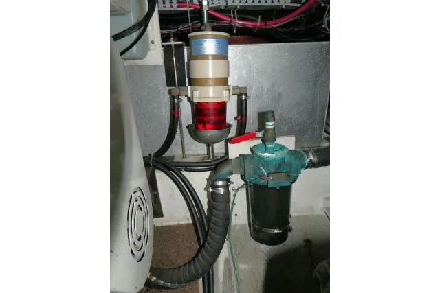 Code Four Yacht Photos Pics Engine room of 2000 Carver 406 Motor Yacht showing fuel filter system.