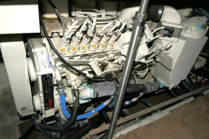 Code Four Yacht Photos Pics Engine compartment of a 2000 Carver 406 Motor Yacht, showcasing mechanical components.