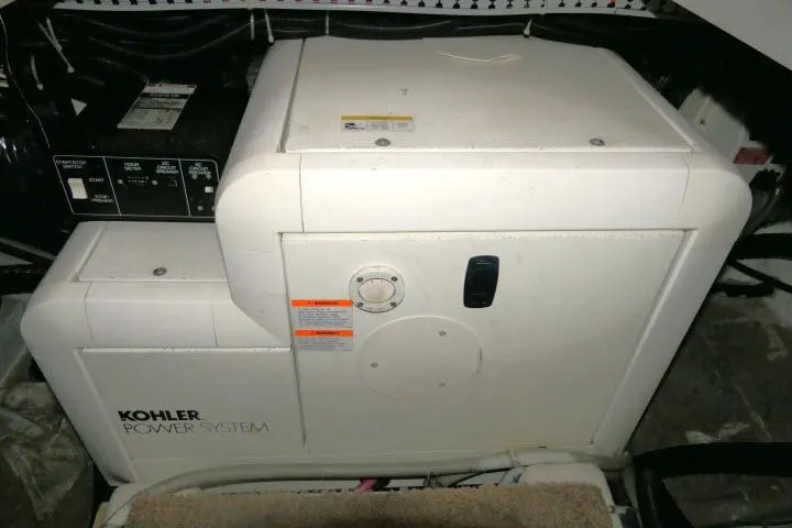 Code Four Yacht Photos Pics Kohler power system in 2000 Carver 406 Motor Yacht engine room.