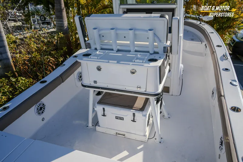  Yacht Photos Pics 2025 Blackfin 242 HB boat interior with storage and seating features.