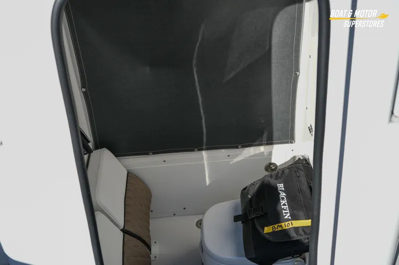  Yacht Photos Pics Interior of 2025 Blackfin 242 HB boat with seating and storage area.