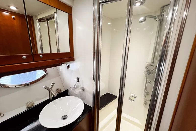  Yacht Photos Pics Luxurious bathroom in 2007 Sunseeker Manhattan 66 yacht with modern fixtures and shower.