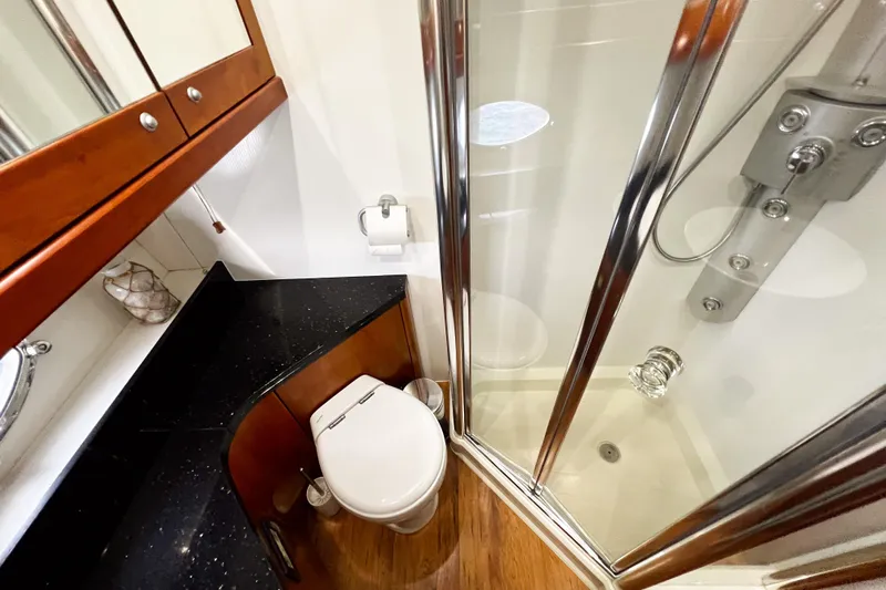  Yacht Photos Pics Luxurious bathroom in 2007 Sunseeker Manhattan 66 yacht with modern shower and sleek design.