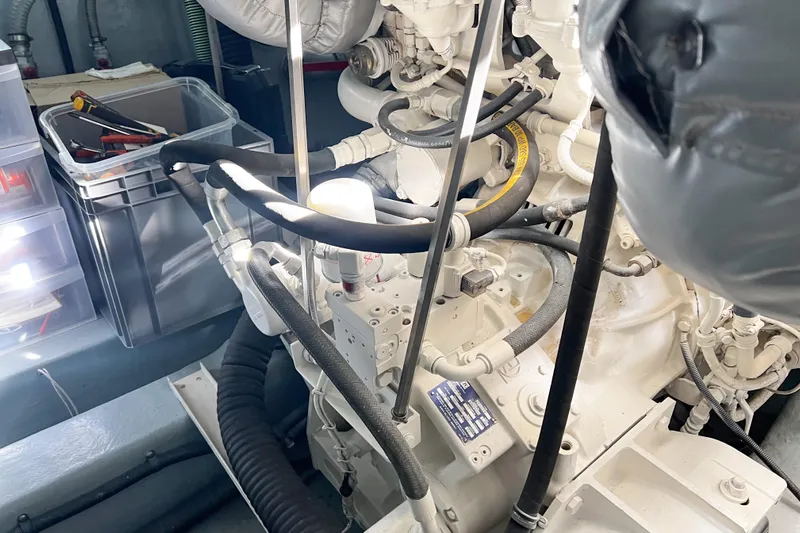  Yacht Photos Pics Engine room of a 2007 Sunseeker Manhattan 66 yacht, showcasing mechanical components.