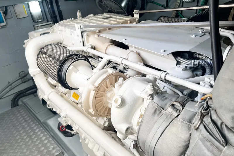  Yacht Photos Pics Engine room of a 2007 Sunseeker Manhattan 66 yacht, showcasing mechanical components.