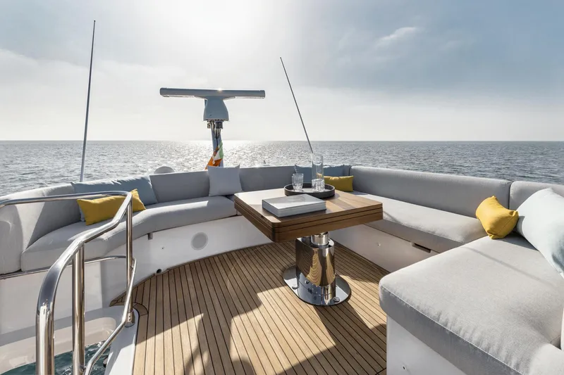  Yacht Photos Pics Luxurious 2024 Azimut Fly 53 yacht deck with elegant seating and ocean view.