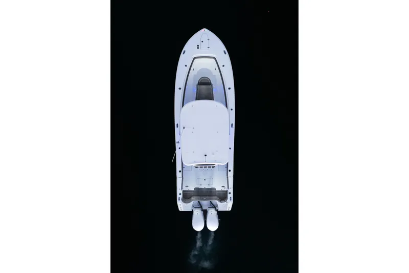  Yacht Photos Pics Aerial view of 2026 Sea Hunt Ultra 305 Coffin Box boat on dark water.