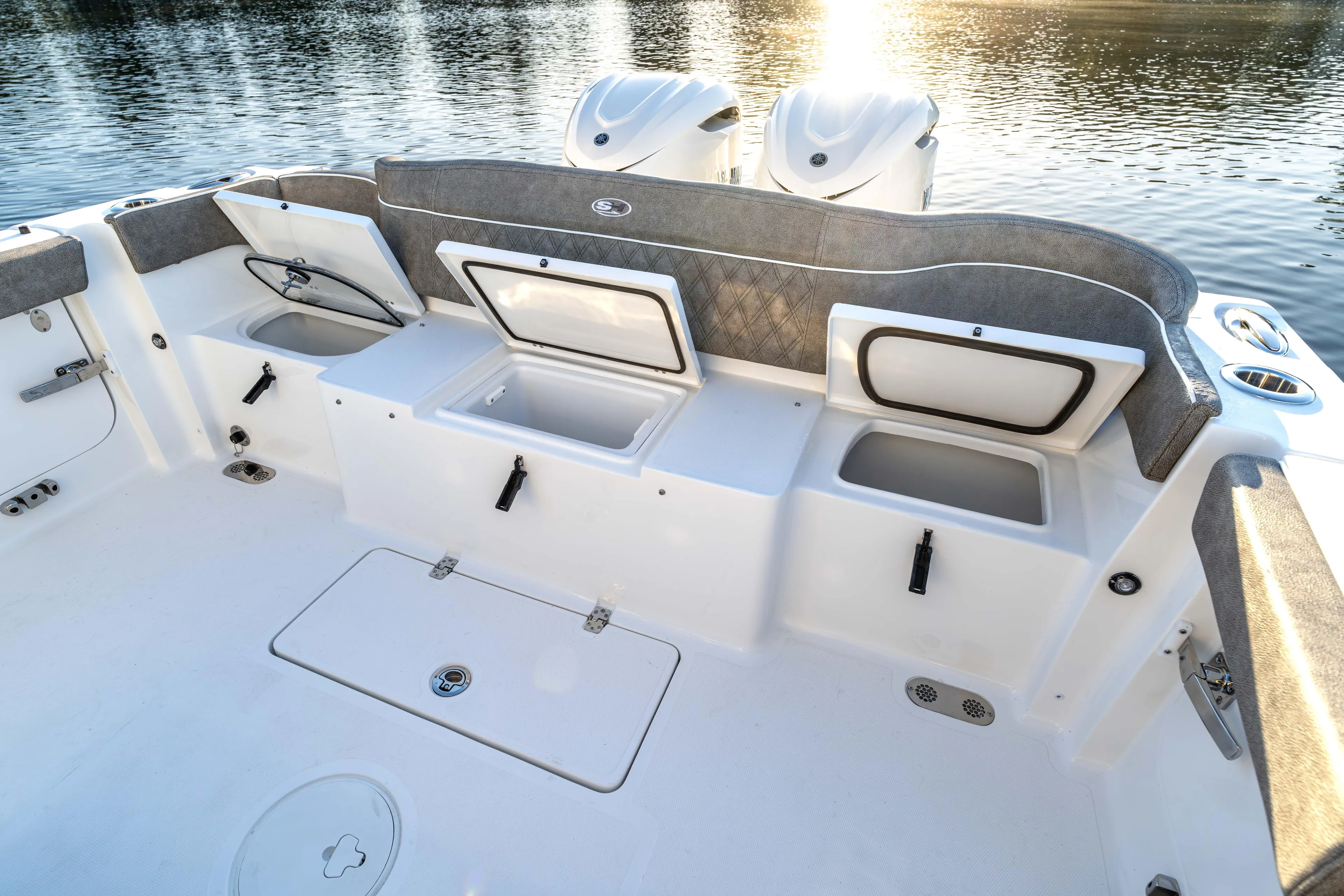  Yacht Photos Pics 2026 Sea Hunt Ultra 305 Coffin Box boat interior with open storage compartments.