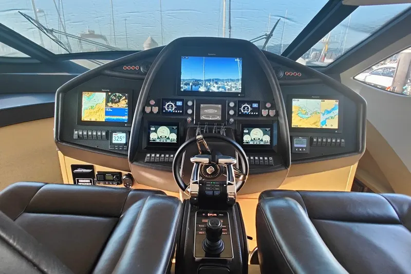 White Shark I Yacht Photos Pics Cockpit of 2010 Pershing 72 yacht with advanced navigation and control systems.