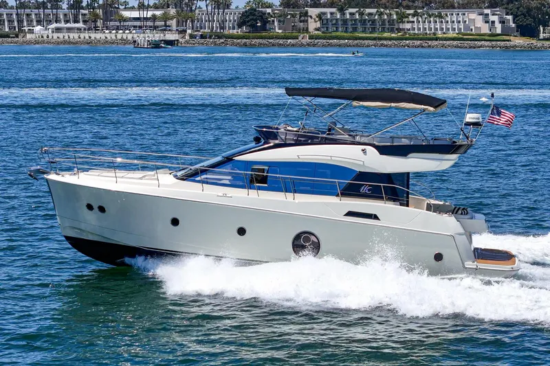 The Riviera Yacht Photos Pics 2017 Beneteau Monte Carlo 5 MC5 yacht cruising on open water.