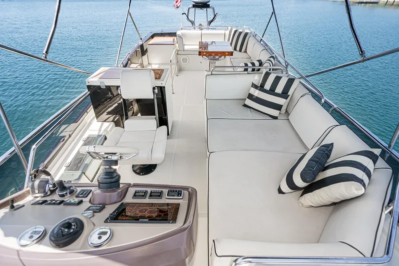 The Riviera Yacht Photos Pics Luxurious 2017 Beneteau Monte Carlo 5 MC5 yacht interior with plush seating and elegant design.