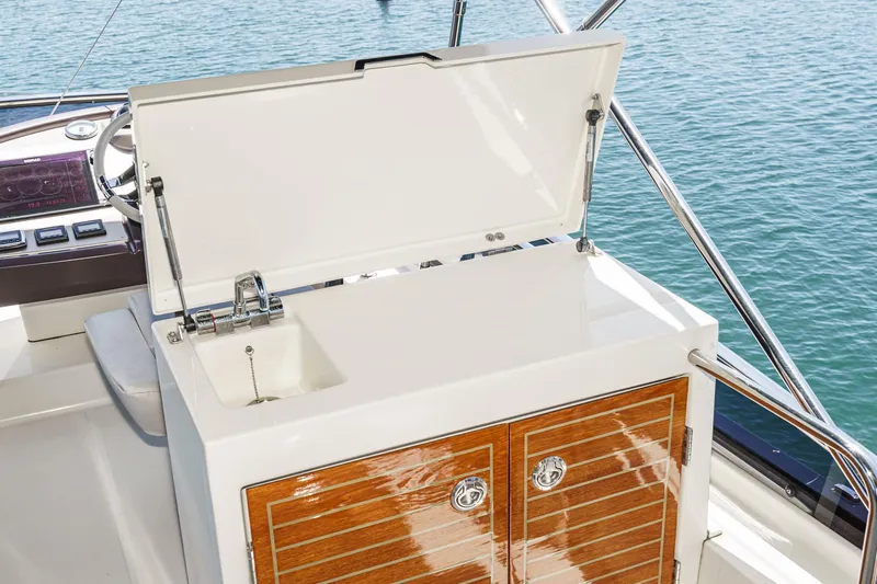 The Riviera Yacht Photos Pics 2017 Beneteau Monte Carlo 5 MC5 yacht sink and storage area on deck.