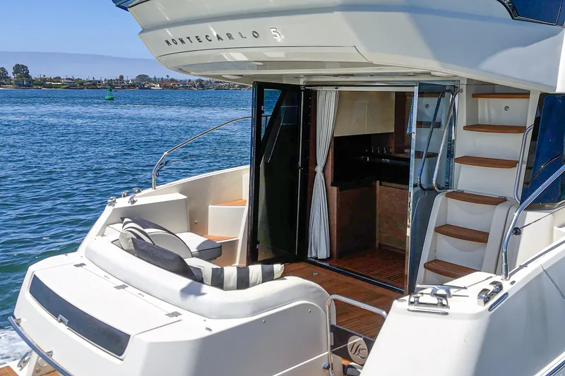 The Riviera Yacht Photos Pics 2017 Beneteau Monte Carlo 5 MC5 yacht with open deck and luxurious interior.