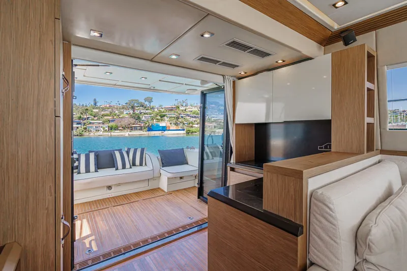 The Riviera Yacht Photos Pics Luxurious interior of 2017 Beneteau Monte Carlo 5 MC5 yacht with scenic water view.