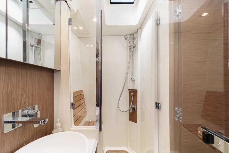 The Riviera Yacht Photos Pics Luxurious bathroom in 2017 Beneteau Monte Carlo 5 MC5 yacht with modern shower.