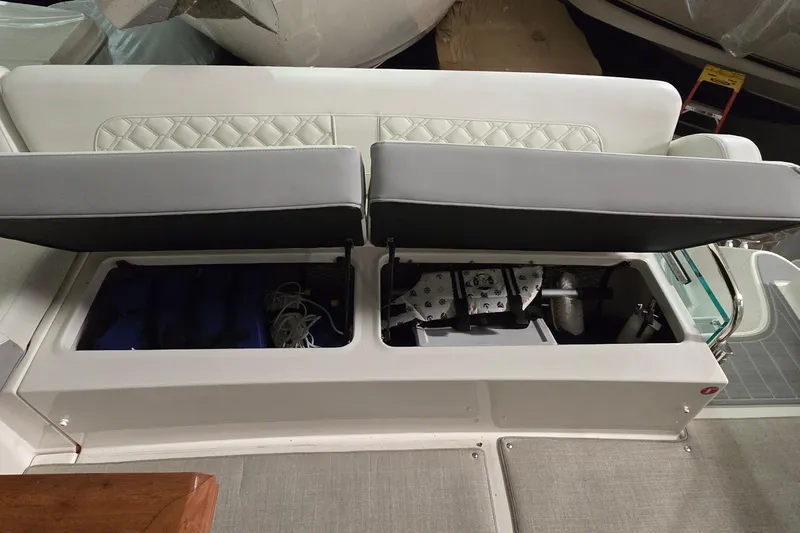 Your So Vein Yacht Photos Pics 2024 Regal 42 Fly boat storage compartment with open cushioned seats.