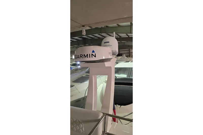 Your So Vein Yacht Photos Pics 2024 Regal 42 Fly yacht with Garmin radar equipment in a marina setting.