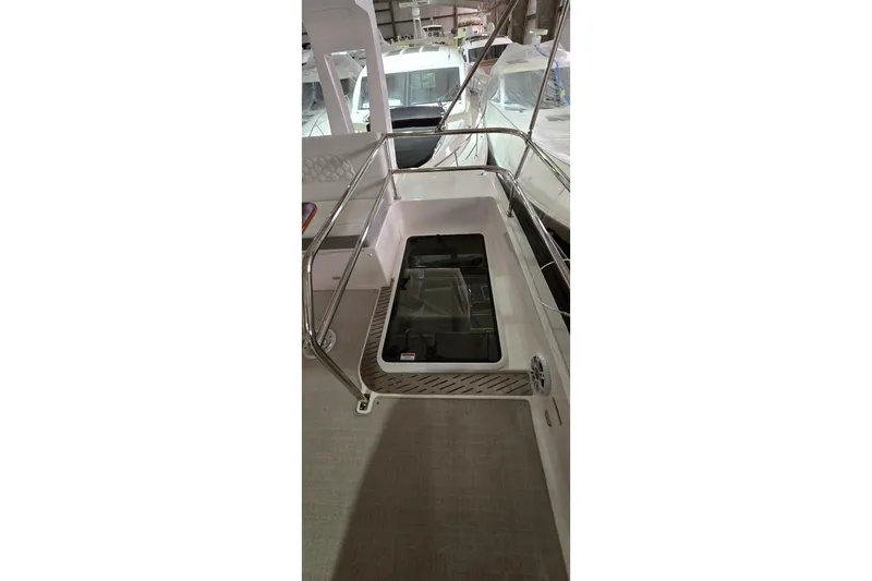 Your So Vein Yacht Photos Pics 2024 Regal 42 Fly yacht deck with railing and hatch.