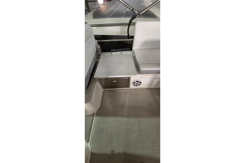 Your So Vein Yacht Photos Pics 2024 Regal 42 Fly yacht interior with seating, table, and speaker.