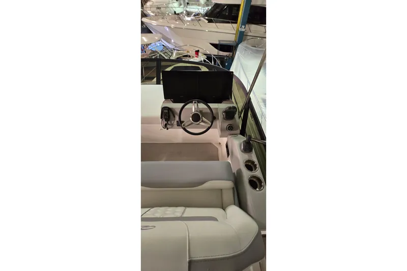 Your So Vein Yacht Photos Pics 2024 Regal 42 Fly yacht helm with modern steering and controls.