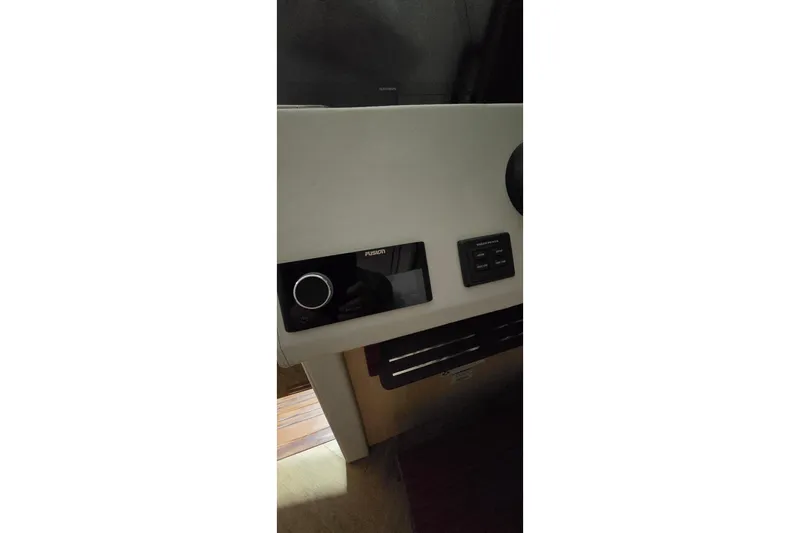 Your So Vein Yacht Photos Pics Control panel of 2024 Regal 42 Fly yacht featuring Fusion audio system.