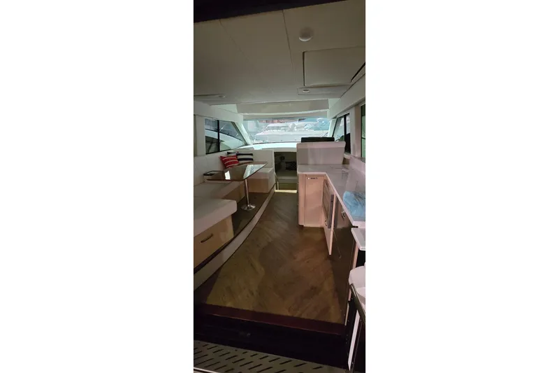 Your So Vein Yacht Photos Pics Interior of 2024 Regal 42 Fly yacht with modern furnishings and spacious layout.