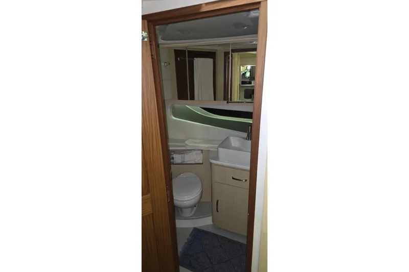 Your So Vein Yacht Photos Pics Luxurious bathroom interior of 2024 Regal 42 Fly yacht, featuring modern fixtures and elegant design.