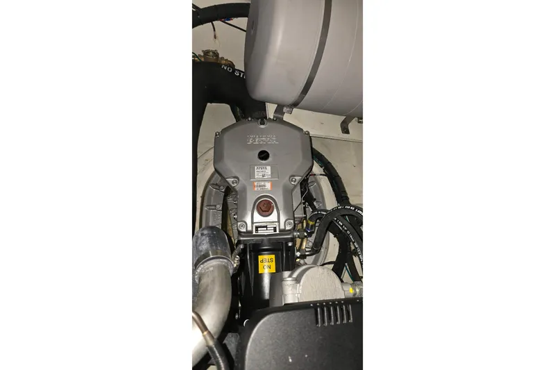 Your So Vein Yacht Photos Pics Engine compartment of 2024 Regal 42 Fly yacht, showcasing mechanical components.