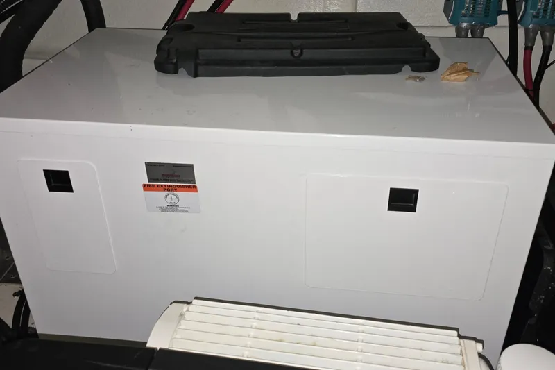 Your So Vein Yacht Photos Pics 2024 Regal 42 Fly engine compartment with fire extinguisher port.