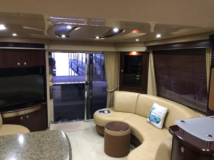 Cashed Out Yacht Photos Pics Luxurious interior of 2006 Sea Ray 58 Sedan Bridge yacht with elegant seating and modern design.