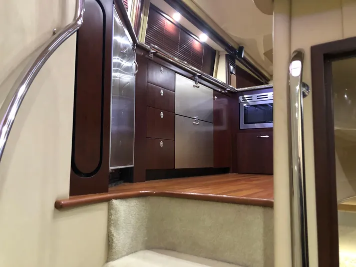 Cashed Out Yacht Photos Pics Interior of 2006 Sea Ray 58 Sedan Bridge yacht with modern kitchen design.