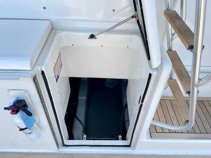  Yacht Photos Pics Hatch entrance on 2000 Ocean Yachts 43 Super Sport with ladder and fire extinguisher.