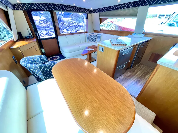  Yacht Photos Pics Luxurious interior of 2000 Ocean Yachts 43 Super Sport with elegant seating and wood finishes.