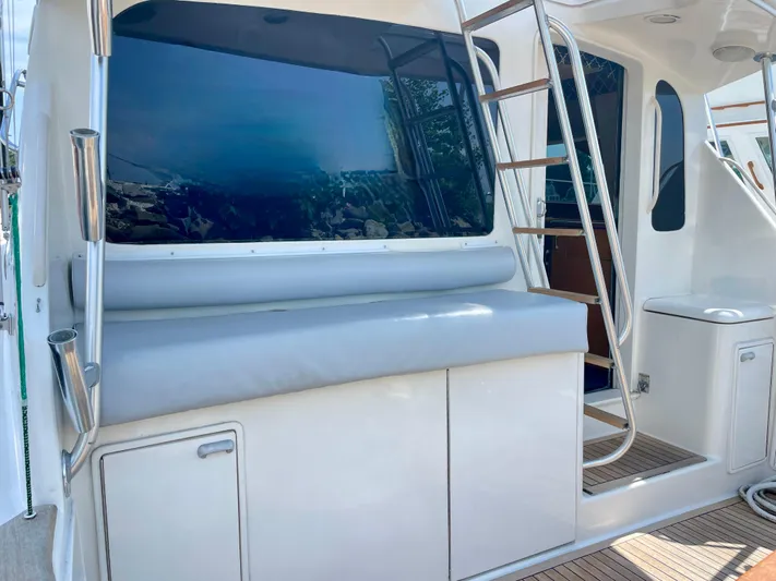  Yacht Photos Pics Ocean Yachts 43 Super Sport 2000 model, featuring sleek exterior and ladder access.