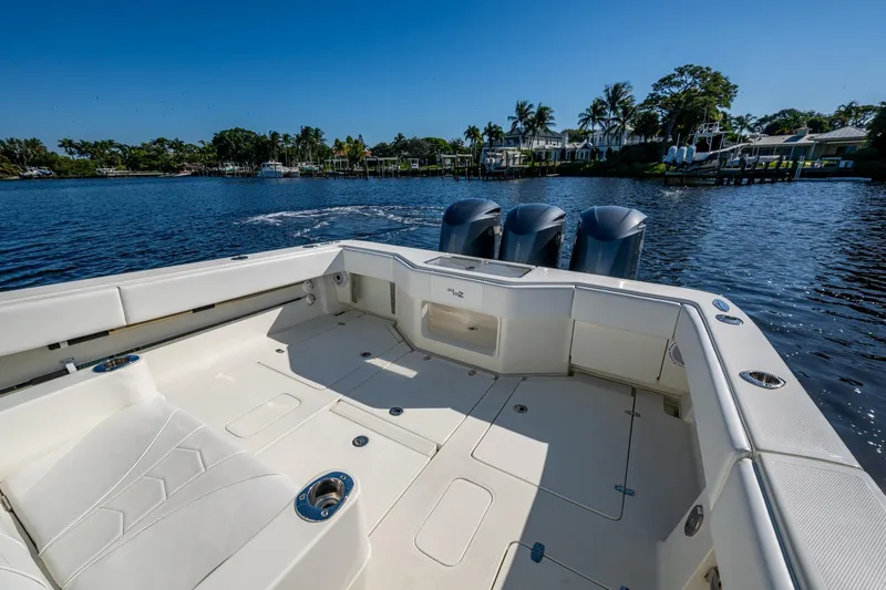  Yacht Photos Pics 2017 SeaVee 390Z boat with triple engines on a sunny day, dockside view.