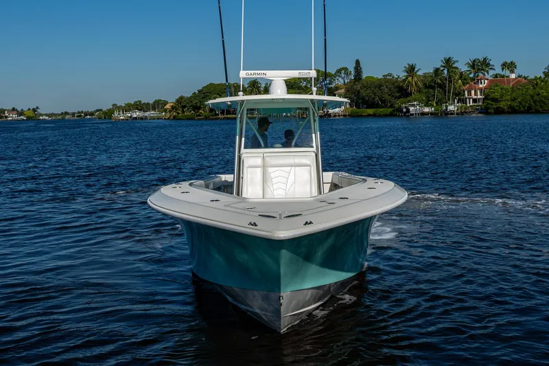  Yacht Photos Pics 2017 SeaVee 390Z boat cruising on a calm blue waterway.