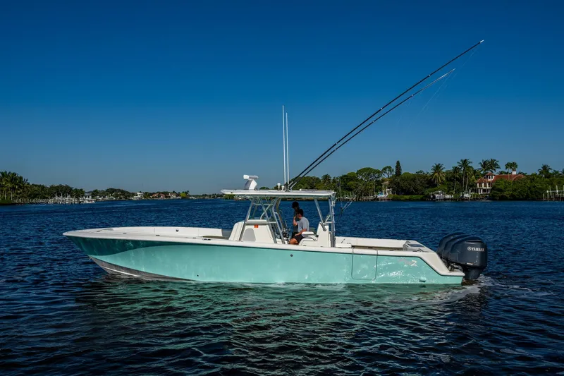  Yacht Photos Pics 2017 SeaVee 390Z boat on calm water, clear sky, and scenic background.