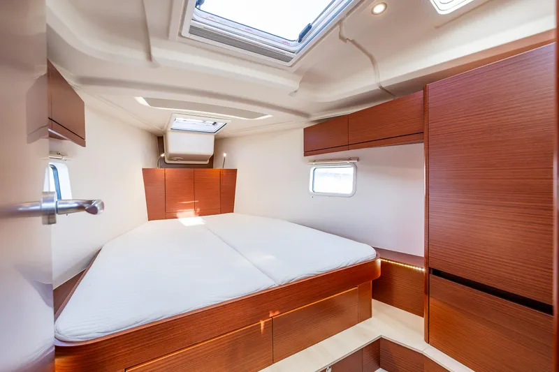 Dragon Fly Yacht Photos Pics Interior cabin of 2019 Hanse 418 yacht with modern wood finish and skylight.