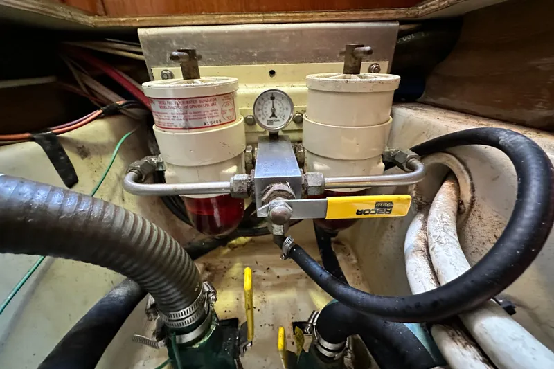 Solimar Yacht Photos Pics Engine compartment of a 2005 Hunter 41 AC with fuel filter and gauge system.