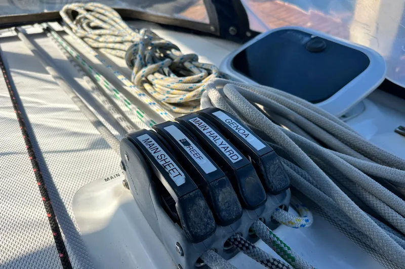 Solimar Yacht Photos Pics Close-up of sailing ropes and cleats on a 2005 Hunter 41 AC yacht deck.