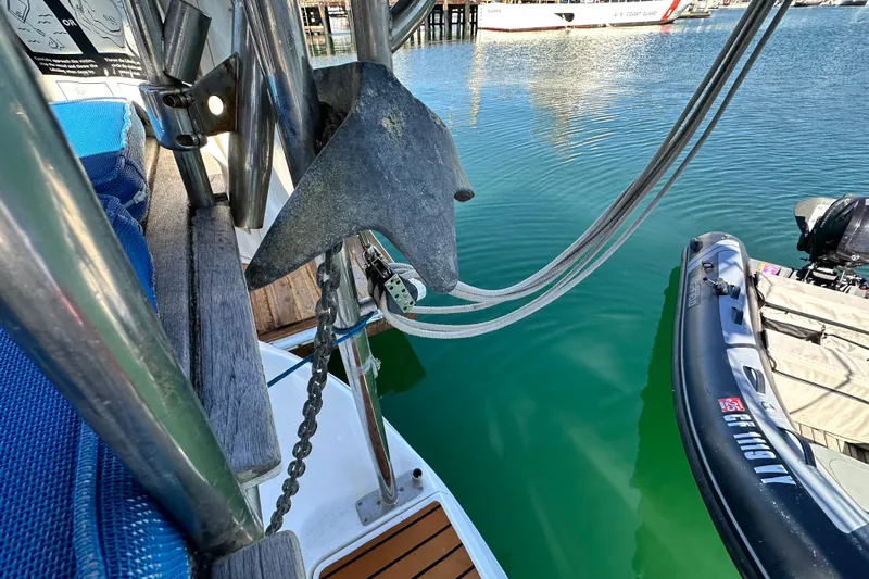 Solimar Yacht Photos Pics Hunter 41 AC 2005 sailboat anchor and ropes near docked inflatable boat.