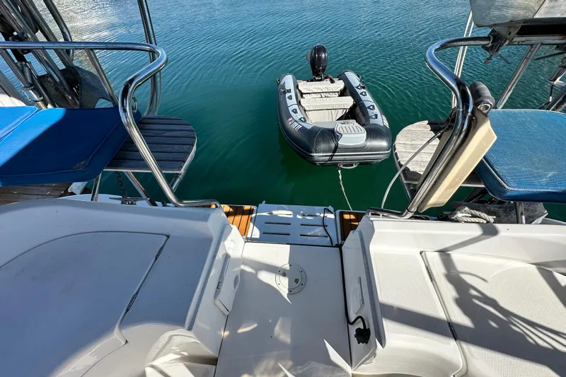 Solimar Yacht Photos Pics Hunter 41 AC 2005 yacht with inflatable dinghy on calm water.
